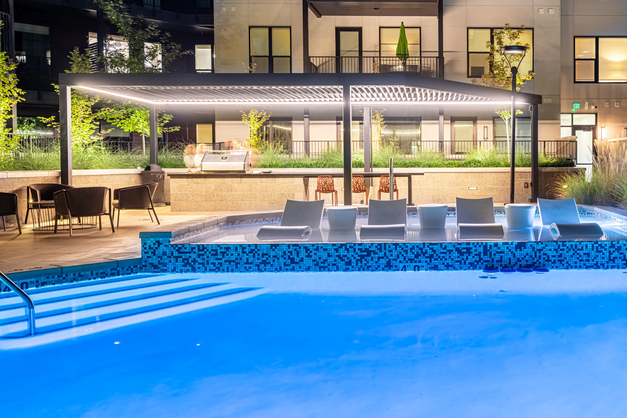 The pool terrace · the building's signature room