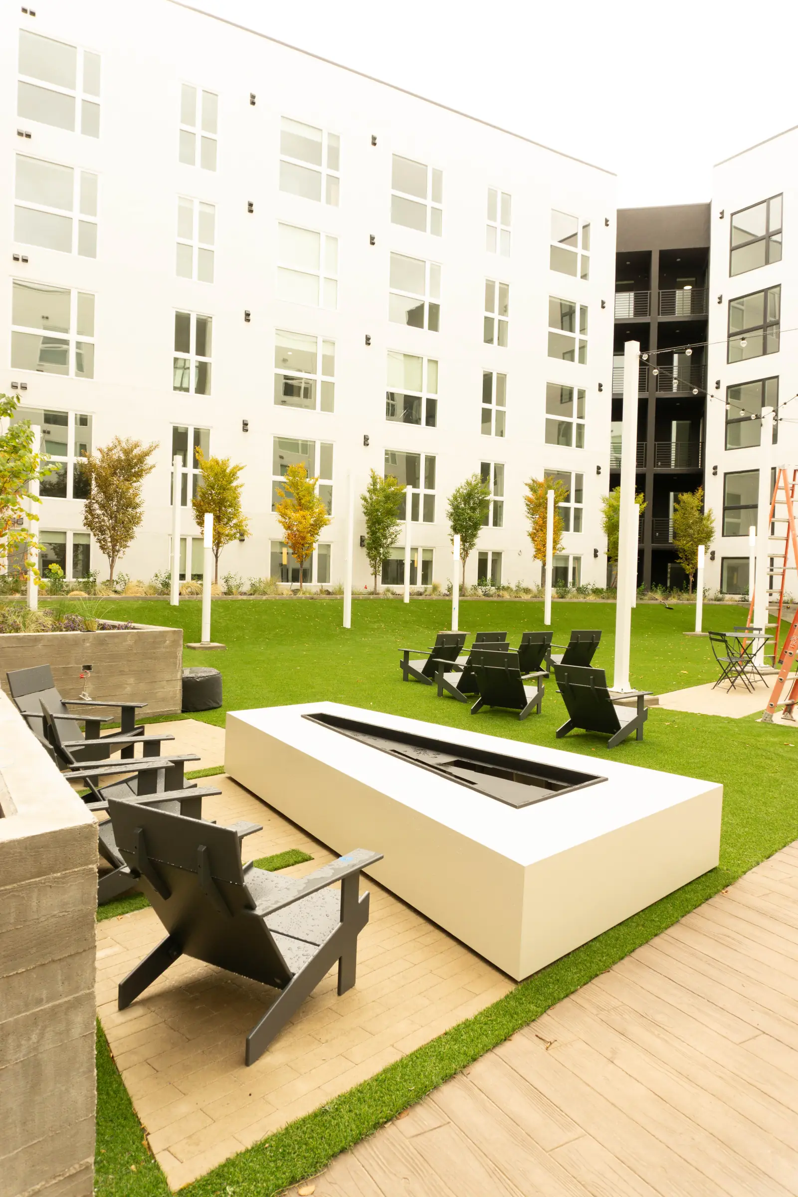 A ground-level firepit lawn