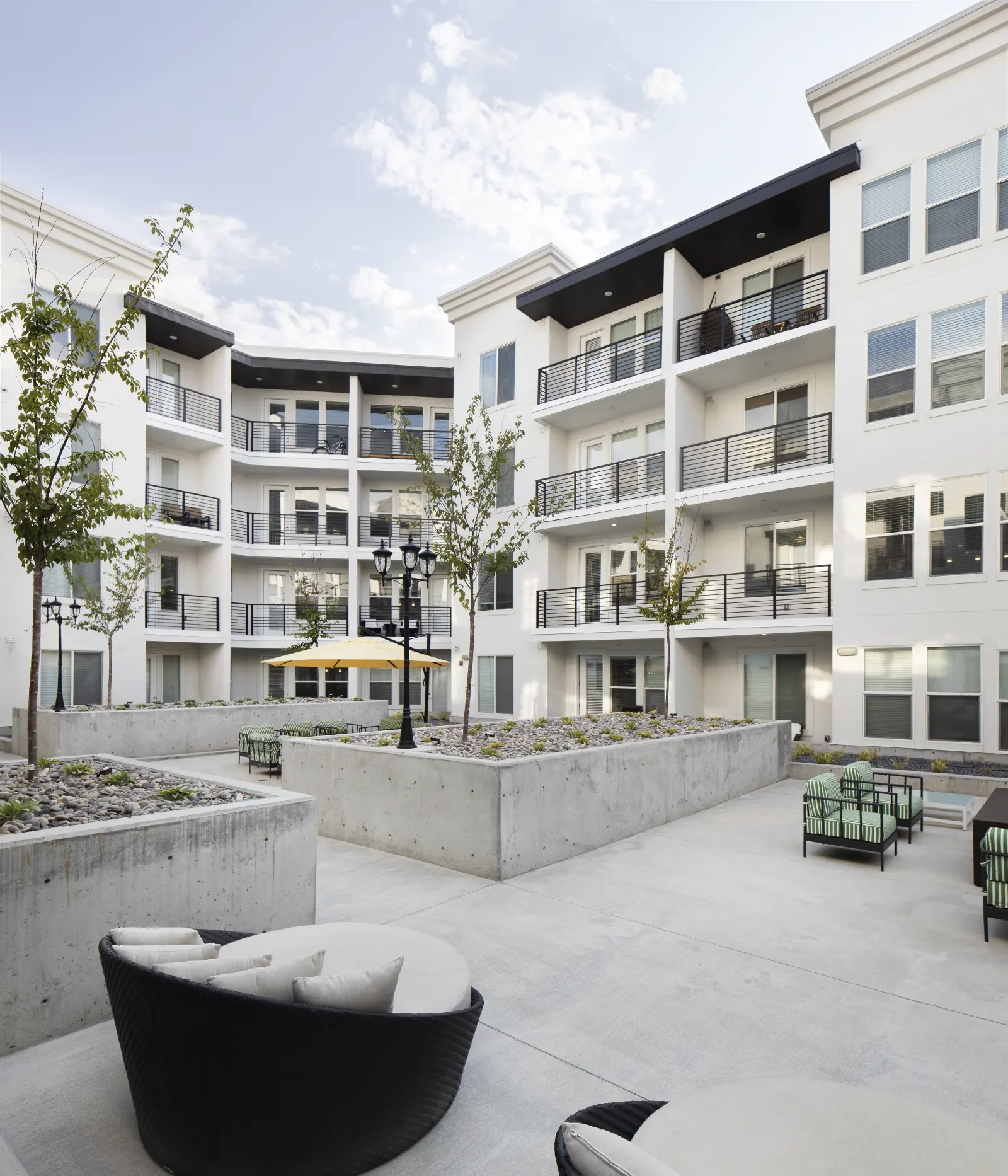 Skyhouse courtyard fountain creating sound, reflection, and a social focal point