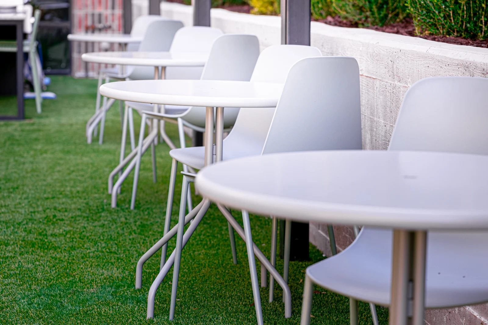 A bistro row at the board-formed planter