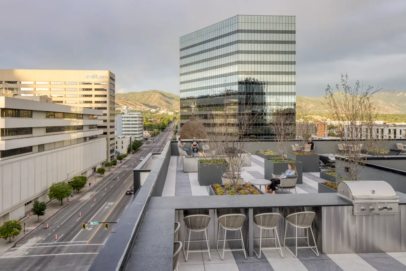 STAND-IN BRANDON TO VET — The Randi rooftop vignette (note: no before/after photo of the surface parking lot exists in the photo set)